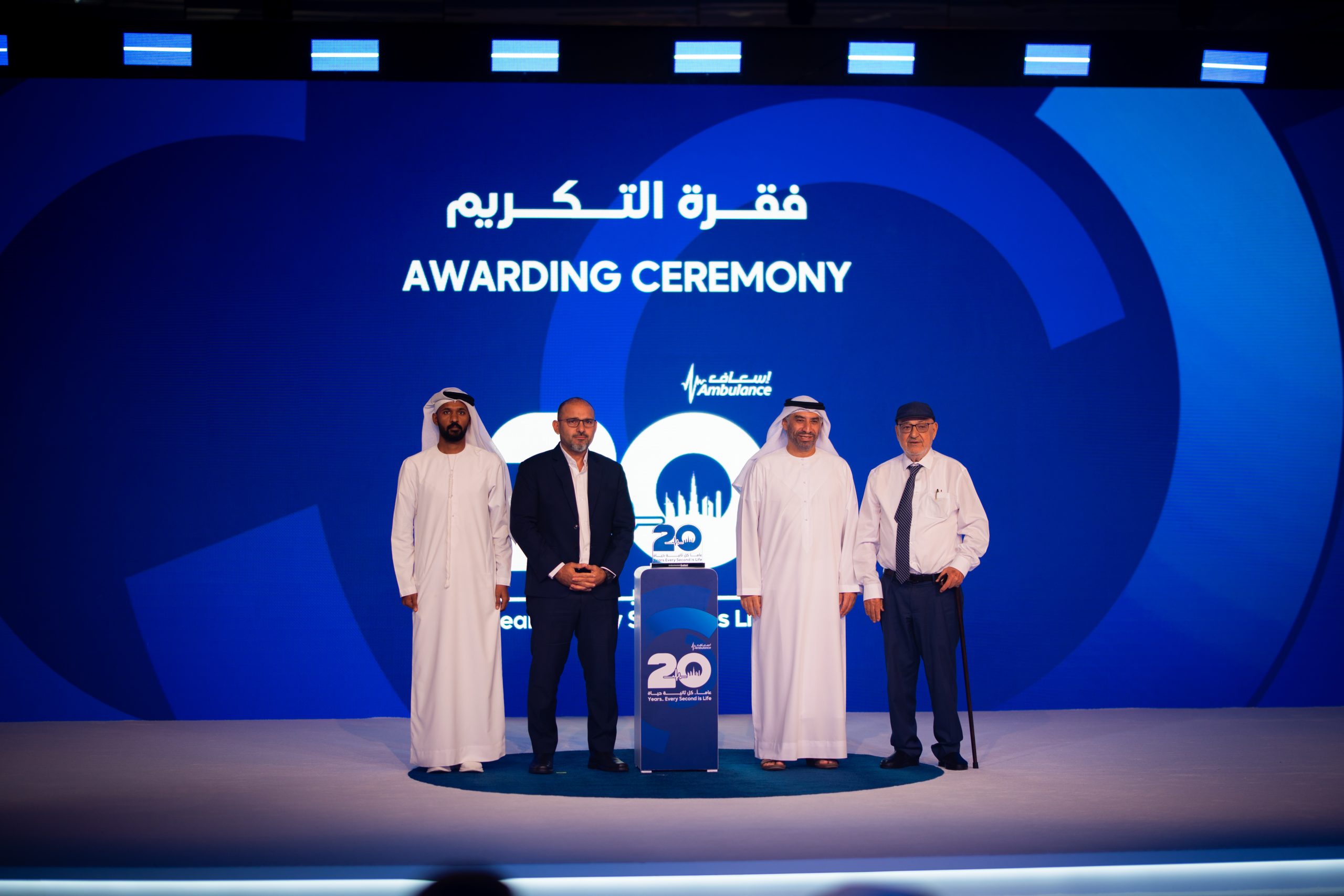 Four representatives stand beside an award on stage at the DCAS Annual Partners Awarding Ceremony.